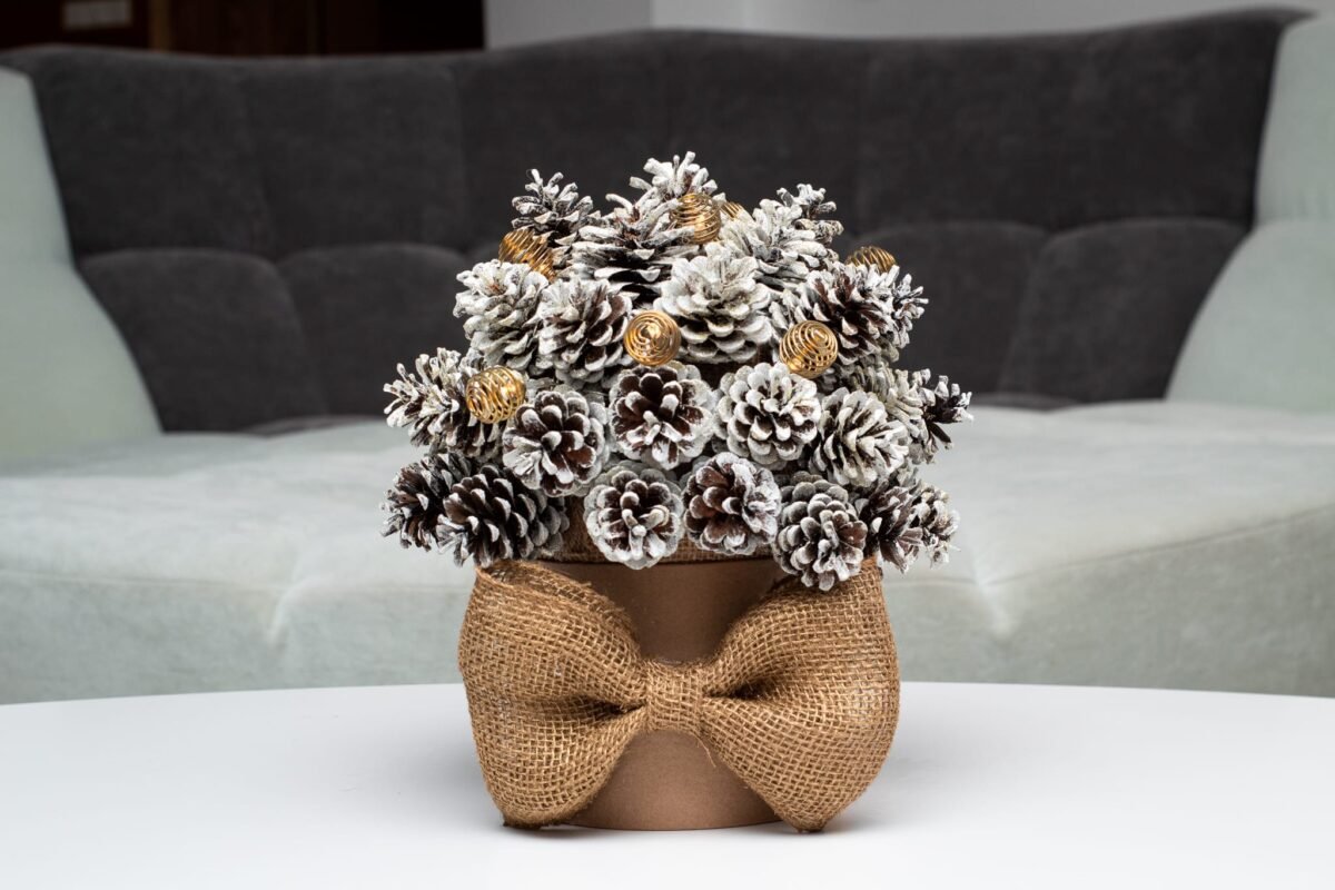 Golden pine cones & string lights bouquet
